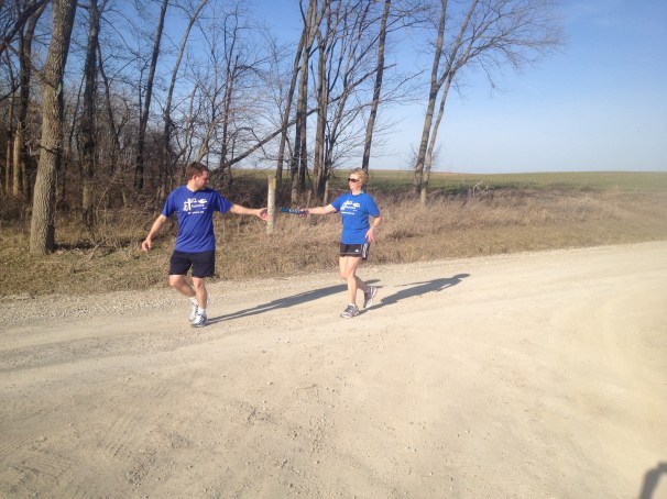 Handing off the East baton to Bernard Krumpelman in Davis, MO after my last leg and Mid-MO portion of Relay.