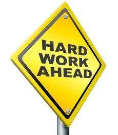 bigstock-hard-work-ahead-yellow-warning-28341908