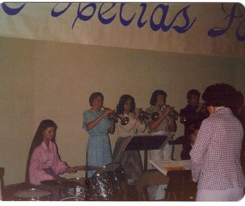 Playing the drums for our high school stage band.  